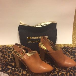 Michael Kors gold studded clogs